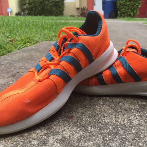 Addis’s Orange and Teal Athletic Sneakers - Picture 4 of 6